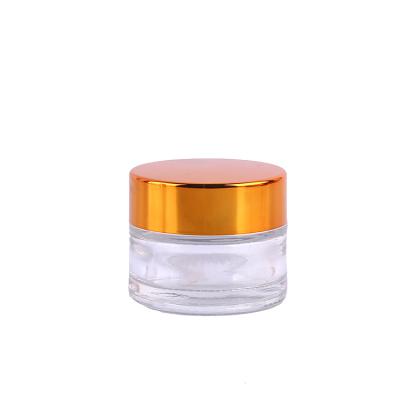 China Cosmetic Round Clear Glass Face Skin Care Eye Cream Packaging Jar With Black Lid And Sealing for sale