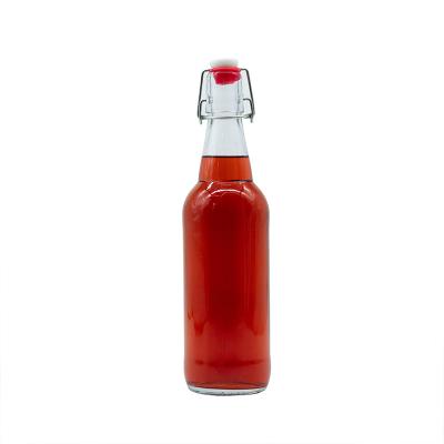 China Beverage Milk Kombucha 1Liter Glass Bottle 1000ml Flip Top Cap 33OZ Beverage With Swing Cap Kitchen Use For Kombucha for sale