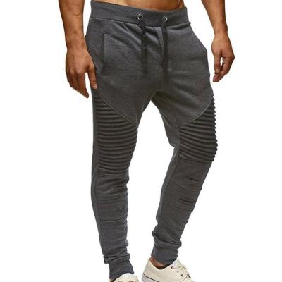 China Unique QUICK DRY Design Summer Men's Casual Pants Foot Fitness Pleat Quilting Casual Slim Pants for sale