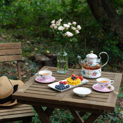 China Viable Flower Tea Set New Product Glass Teapot With Ceramic Heater Tea Cups With Saucers Cardamom Tea Set for sale