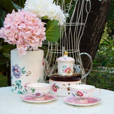 China Viable Cardamom Teapot Set Flower Glass Tea Set With Ceramic Warmer Fine Bone China Tea Cups With Saucers Chinese Style Tea Set for sale