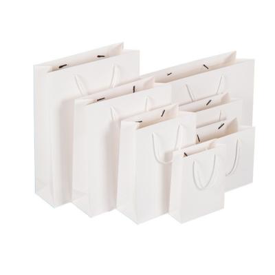 China Recycled Materials Custom Printed White Luxury Jewelry Boutique Retail Gift Wrapping Shopping Paper Bag for sale