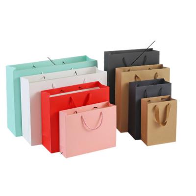 China Recycled Materials Gift Paper Bag Cosmetics Custom Printed Packaging Shopping Paper Bag With Handles for sale