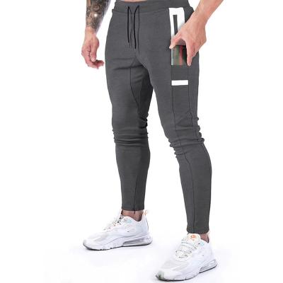 China Slim Fit Anti-wrinkle Outdoor Sports Pants Mens Fitness Pants Slim Fit Feet Pants OEM&ODM for sale