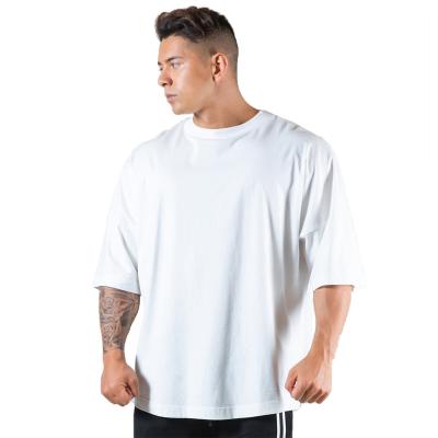 China Anti-Wrinkle Muscle Fitness Brother Sports Men T-shirt Summer Round Neck Cotton Running Casual Short Sleeve Top for sale