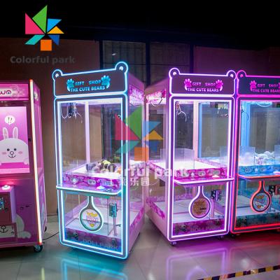 China Park plastic colorful vending machine, mini claw machine, claw hoist machine for sale