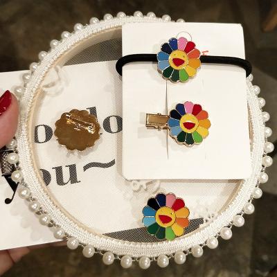 China Modern Minimalist The Same Colorful Sunflower Brooch Pin Badge Japanese Flower Oil Dripping Alloy Bag Accessories Beautiful for sale