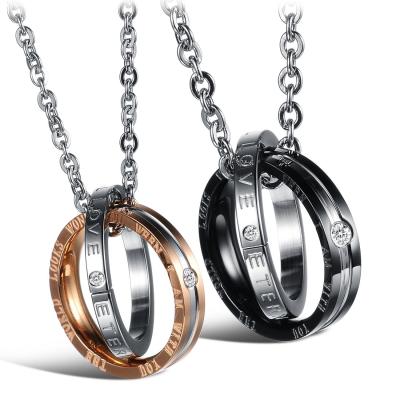 China Wholesale classic titanium jewelry double ring jewelry couples steel necklace European and American hyperbole border steel pendant for sale