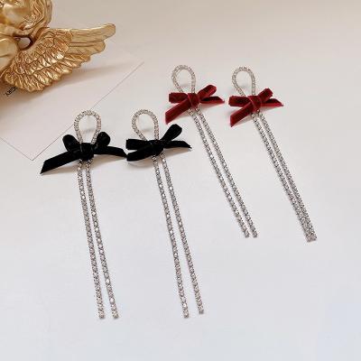 China Retro Korea Celebrity Femininity Earrings Long Tassel Cute Black Line Round Thin Face Earrings Retro Bow Velvet Earrings. for sale