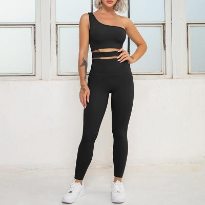 China Breathable Women One Shoulder Padded Black Sports Bra And Legging Recycled Fabric Yoga Set Fitness Womens Sport Suit for sale