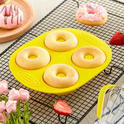 China 2021 Viable New Product Non-Stick Yellow Silicone Donuts Molds Tools Donuts Wholesale Baking Molds for sale