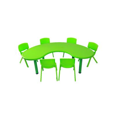 China Factory direct supply competitive price wholesale cheap green shape plastic half moon indoor plastic study table for kids for sale