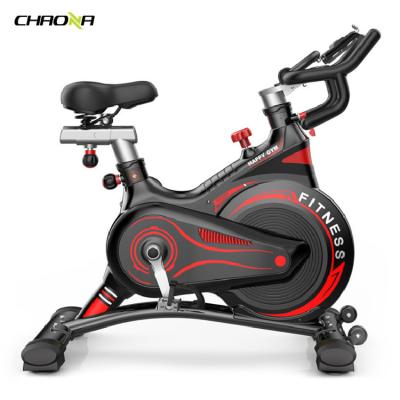 China Commercial Use Full Covered Flywheel Safety With Heart Rate For Adults Rotating Magnetic Bike Exercise Bike for sale