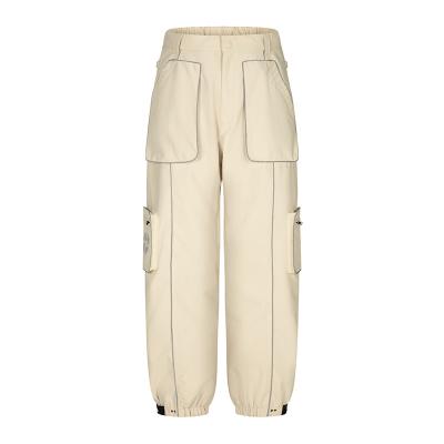 China Pantalones unisex para esquí de nieve con pegamento de presión total con línea reflectante con impresión de transferencia de calor en venta