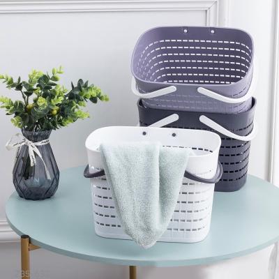 China Contemporary Portable Bathroom Plastic Hollow Out Laundry Storage Basket Organizer Kitchen Sundries Storage Basket for sale