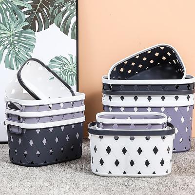 China Contemporary Portable Bathroom Plastic Hollow Out Laundry Storage Basket Organizer Kitchen Sundries Storage Basket for sale