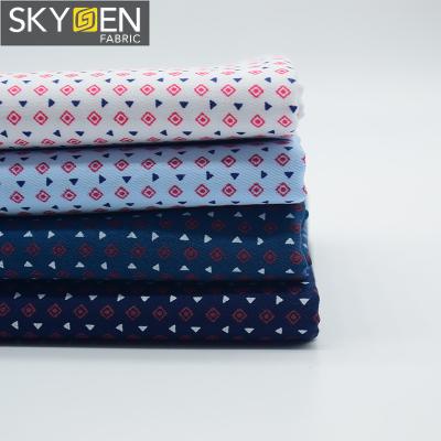 China Skygen anti static 100%cotton silky combed woven cheap wholesale scattered print fabric for sale