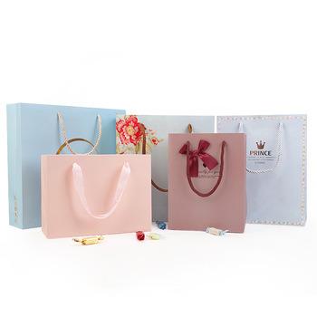 China Recyclable Wholesale Kraft Paper Bag With Logo Printed Custom Paper Bag For Gift Packaging With Handle for sale