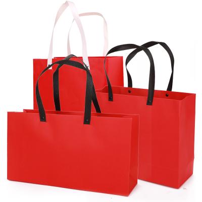 China Customized Logo Eco - Friendly Brand Recyclable Stylish 250gsm Bags Plain Paper Bag for sale