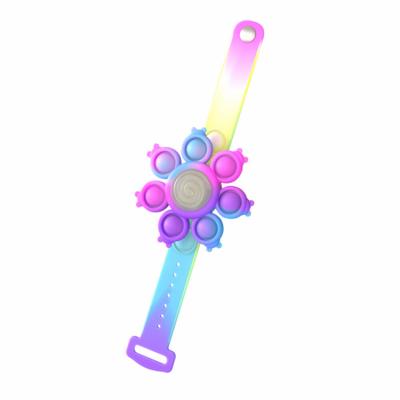 China Silicone Trigger Strap Spinning Glow in the Dark Sticky Person Watch Push Bubble Wristband Sensory Toy for sale