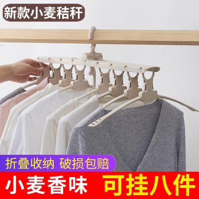 China Modern Space Saving Drying Plastic Organizer Racks Multi Functional Folding Magic Clothes Hangers for sale