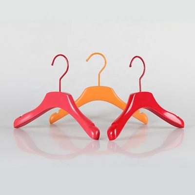 China Luxury Shiny Child Coat Hanger Wooden Laser Custom Logo Red Color Material Eco-Friendly For Clothing Rack for sale