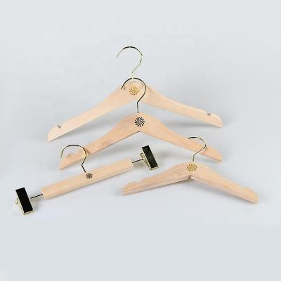 China Eco-friendly Material Customized Wooden Kids Clothing Hangers With Metal Clip for sale