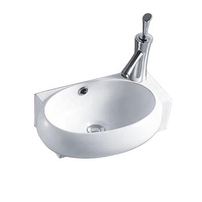 China Small Wall Mount Sink Eco-Friendly Oval Mini Ceramic Modern Corner Bathroom Cloakroom Basin in White - With Overflow for sale