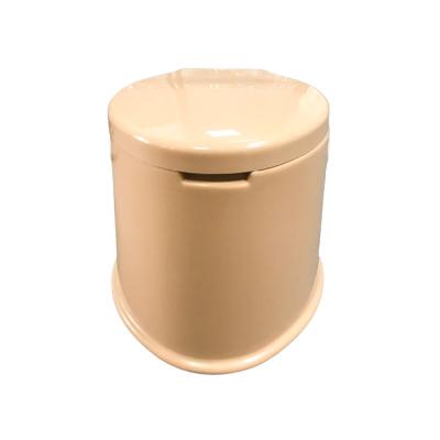 China Concealed Tank Brown Color Plastic Portable Camping Toilet for sale