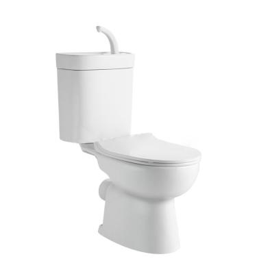 China New Double-Flow Bathroom Wc Floor Standing Ceramic Two Piece Toilet Bowl For Home for sale