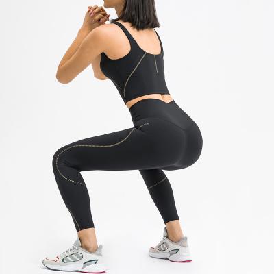 China Breathable Two Piece Fitness Wear Leggings Gym Sportswear Solid Color Sports Running Suits Wholesale Spring Women's Yoga Sets for sale