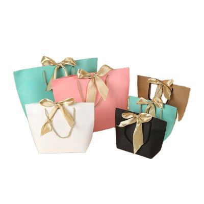 China Recyclable Boutique Shopping Packaging Customized Euro Tote Paper Colorful Gift Bags Printed With Logo Jewelery Paper Bag for sale