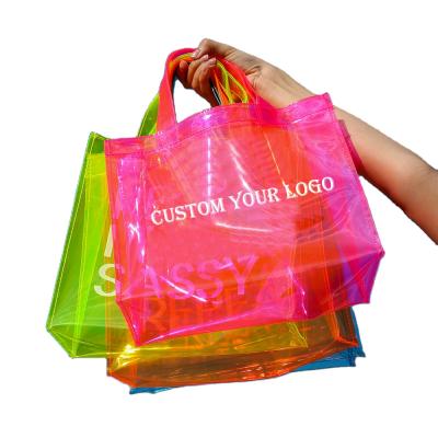 China Fashion Luxury Handbags Custom Waterproof Purses Handbags For Women Transparent Neon PVC Jelly Tote Bag Women Beach Hand Bag for sale