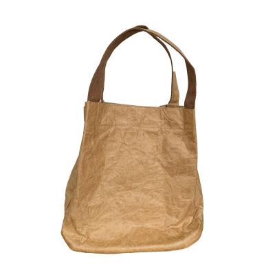 China Custom High Quality Kraft Paper One-Shoulder Cross - Body Women's Tote Bucket Bag Supplier Paper Shopping Bags Retro for sale