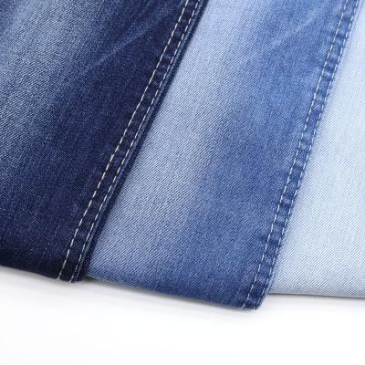 China Hot Sale Wholesale 10oz Polyester Viscous Jeans Fabric Thin Denim Fabric Denim Netting for sale