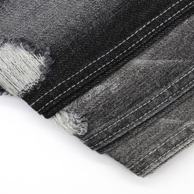 China Breathable Nice Stretch 100 Cotton Non Wick Black Denim Fabric Fancy Wholesale for sale