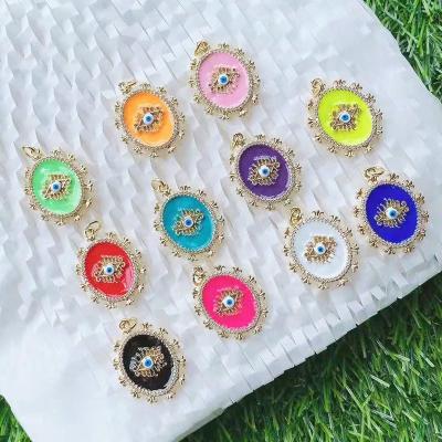 China Romantic Enamel Jewelry 18K Gold Plated Turkish Oval Evil Eyes Pendant Charm for sale