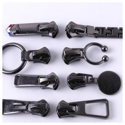 China Other Bright 3# 5# Metal Gun Zipper Bag Zipper Trouser Bag Slider Copper Tooth Alloy Slider Black Nickel Stain Metal Zipper Head With Lock for sale