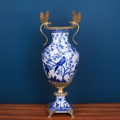 China Ceramic Vintage European Style Soft Mounted Vase With Copper Blue And White Porcelain for sale