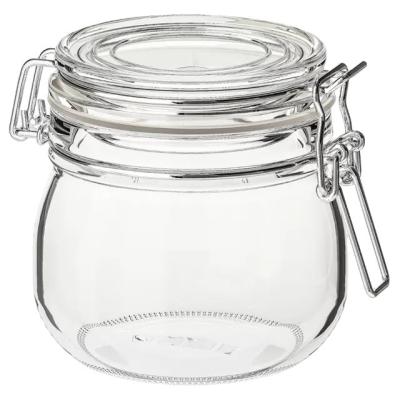 China 600mL Eco-friendly Oval Mason Jar With Insert Glass Honey Wholesale Glass Bottle With Locking Lid for sale