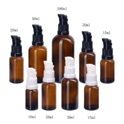 China Personal Care Empty Brown Glass Cosmetic Bottles 5ml To 100ml Amber Glass Bottles With 18/415 Plastic Spout Lotion Pump Dispenser For for sale