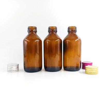 China Empty amber glass syrup packaging 120ml medicine oral syrup bottle for cough syrup and weight gain syrup for sale