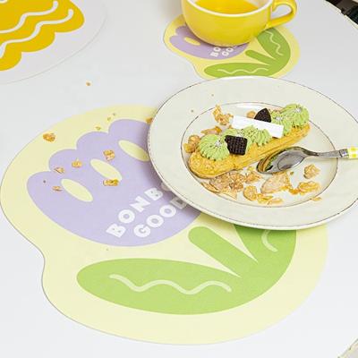 China Viable Leather Table Mats Sets PVC PU Place Mat Tulip Decoration Kitchen Accessories Dining Table Mats Heat Resistant Waterproof Cute for sale