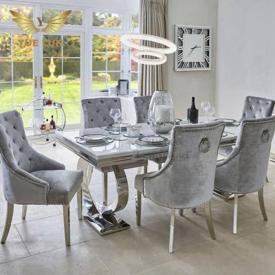 China Eco-friendly Luxury Elegant Modern Marble Stainless Steel Dining Table With 6 Chairs Set for sale