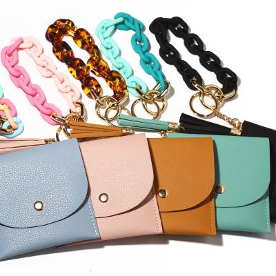 China 2022 anti-theft new wristband wrist key chain wallet acrylic leather short flower printing ladies card holder for sale