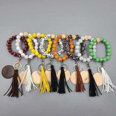 China 2022 Monogrammed Wooden Volleyball Wood Beads Bracelet Bangle Sport Baseball Football Monogram Bracelet With Key Chain for sale