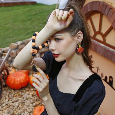 China Silicone / Plastic Cute Waterdrop Silicone Beads Luminous Wrist Keychain Pumpkin Halloween Carnival Key Chain for sale