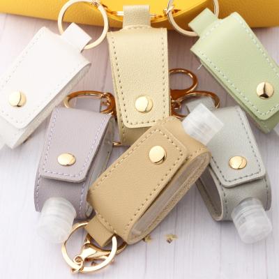 China Compression Leather Portable Bottle Leak Proof Travel Holder Hand Sanitizer Key Chain Bottle Bag Pouch for sale