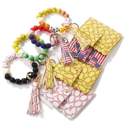 China Wholesale Anti-theft Silicone Beads Elastic Baseball Wristband Card Holder Wallet Card Holder Beads Wristband Key Ring With Tassel Key Chain for sale