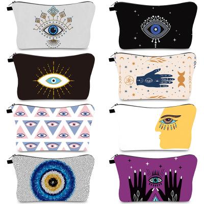 China Fashion Devil's Eye Magic African Make Up Organizer Makeup Cosmetic Bag Travel Pouch Toiletry Bag Women Travel Cosmetic Bag for sale